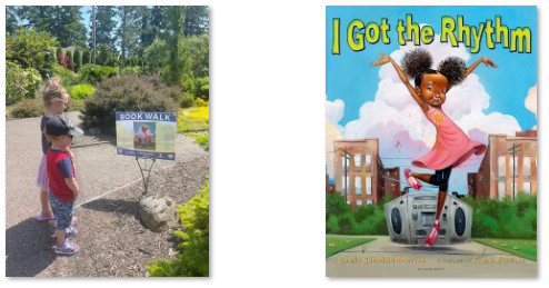 2023 Photo of two children reading I Got the Rhythm at the Everett Arboretum